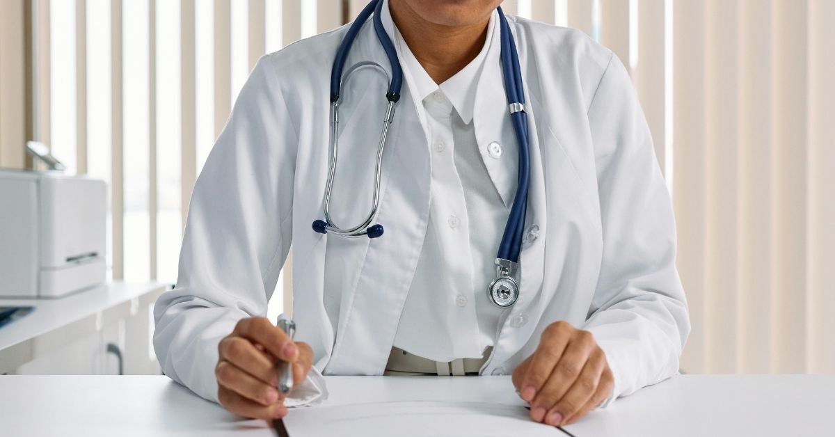 Doctor working on HR tasks