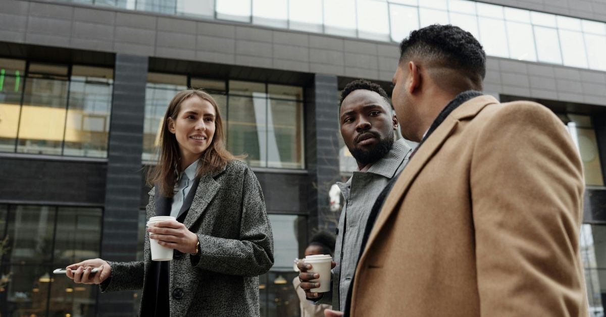 employees outside talking